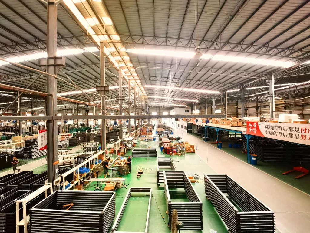 Starveil curtain-wall manufacturing floor in Foshan with aluminium fabrication equipment and organised work zones