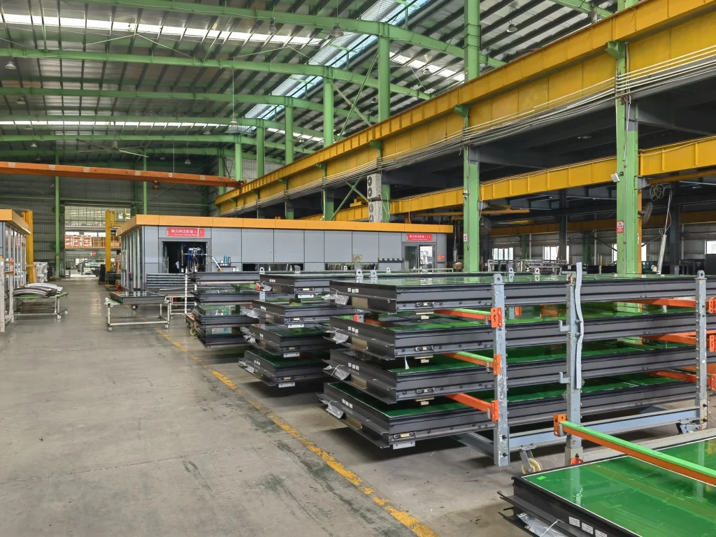 Wide view of the Starveil facade production area and material workflow in Foshan