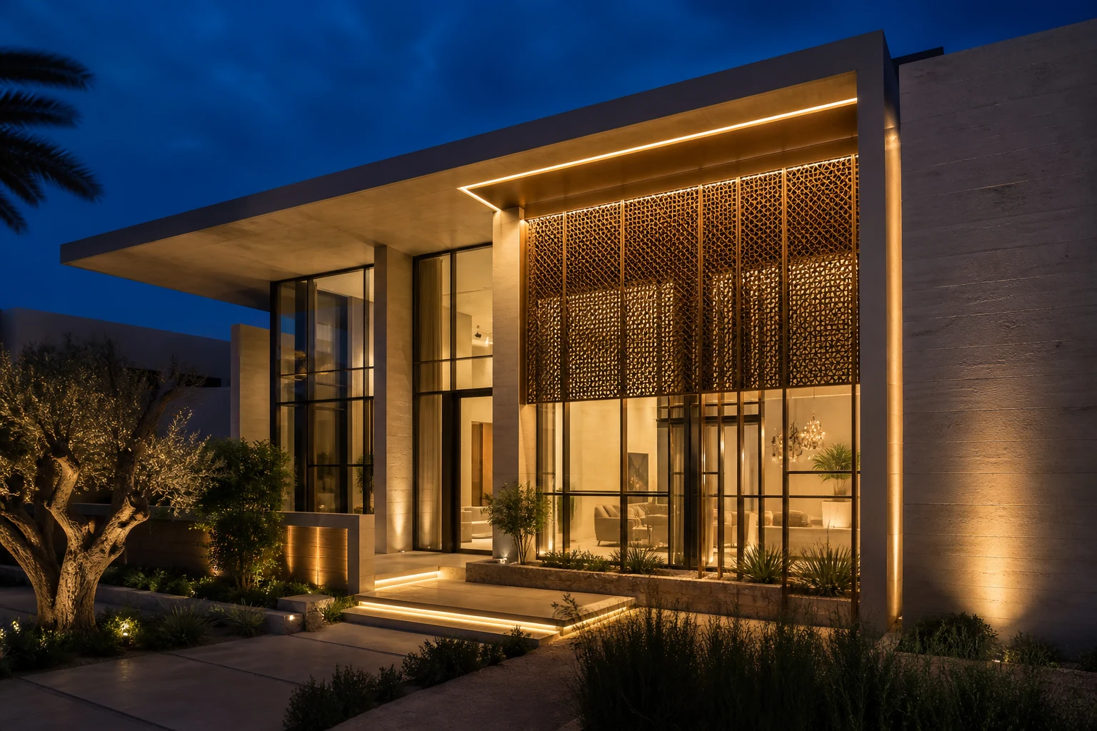 Contemporary Gulf facade with warm lighting integrated into glass and architectural screens